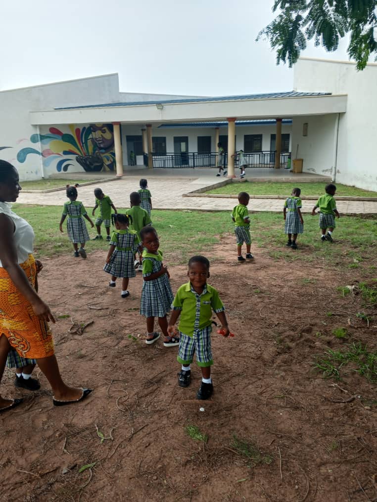 Students in traditional smocks during Heritage Day